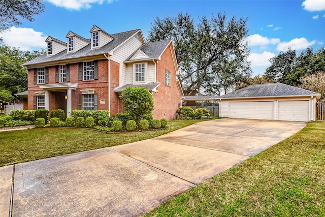 view of front of house featuring a garage and a front lawn