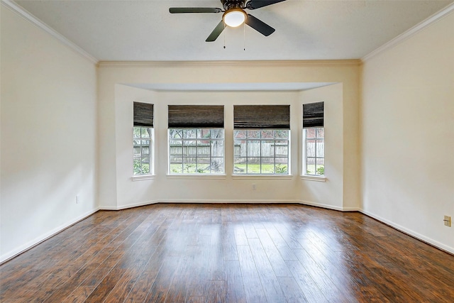 unfurnished room with ceiling fan, ornamental molding, and dark hardwood / wood-style flooring