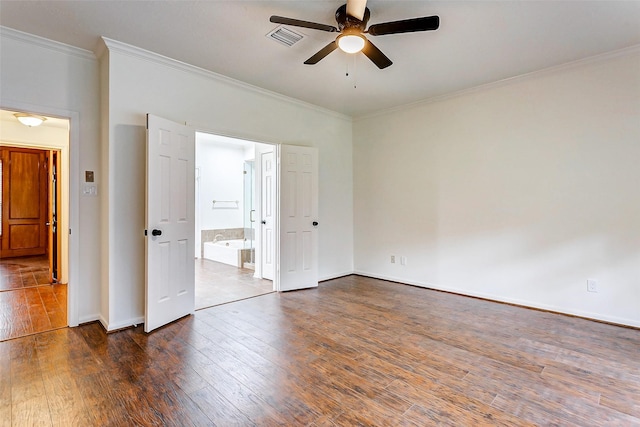 empty room with crown molding, dark wood-type flooring, and ceiling fan