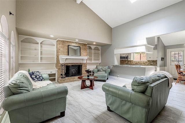 living room with high vaulted ceiling