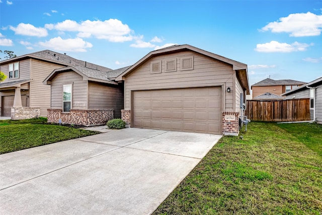 ranch-style home featuring a front yard and a garage