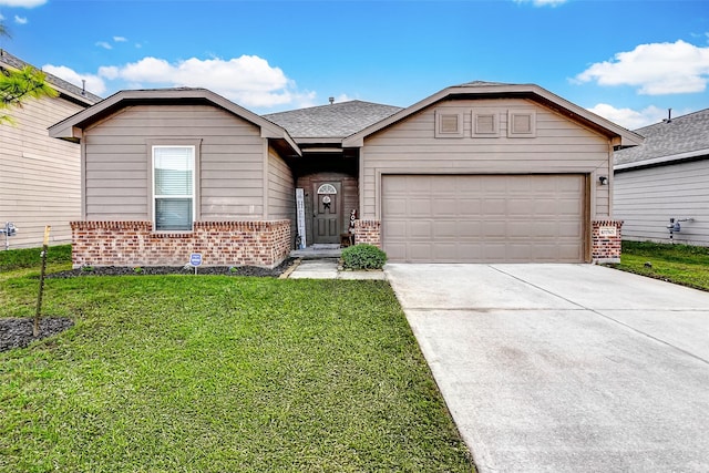 ranch-style home with a front yard and a garage