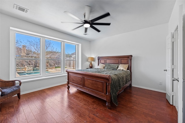 bedroom featuring ceiling fan and dark hardwood / wood-style flooring