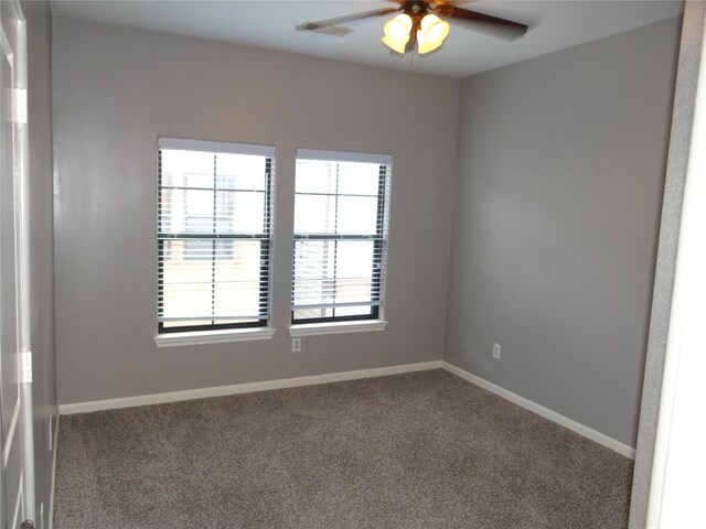 3932 Feagan St, Houston, TX 77007 - empty room featuring a ceiling fan, carpet, and baseboards