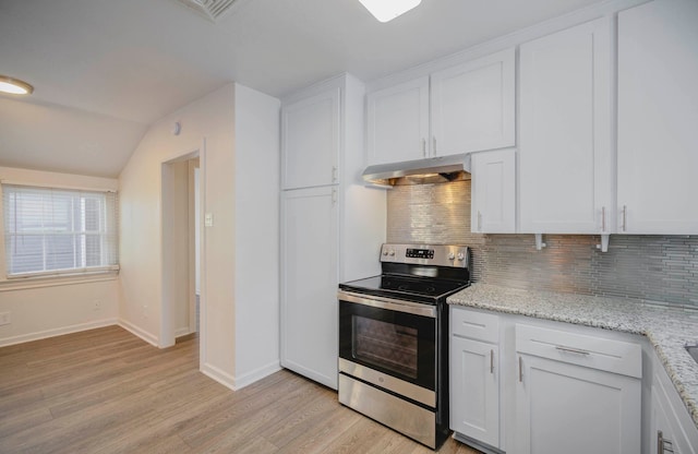 kitchen featuring electric stove, white cabinetry, lofted ceiling, and light wood-type flooring