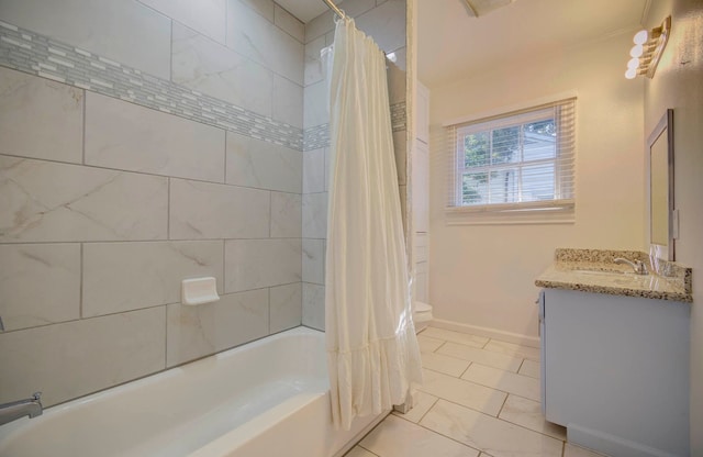 full bathroom featuring vanity, toilet, and shower / bathtub combination with curtain