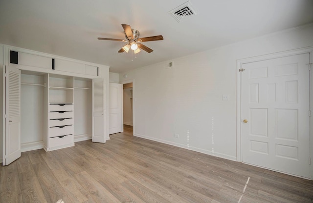 unfurnished bedroom with a closet, ceiling fan, and light hardwood / wood-style flooring