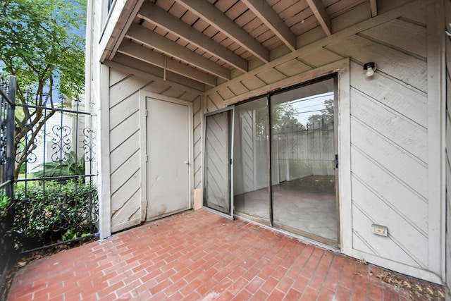 entrance to property with a patio area