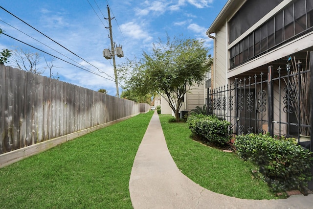 surrounding community featuring a yard