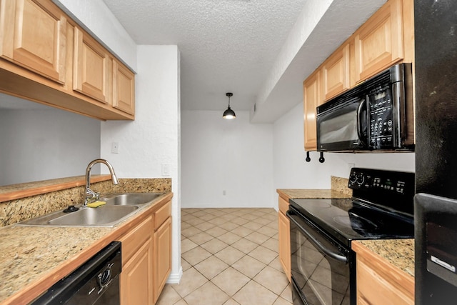 kitchen with black appliances, light tile patterned floors, sink, and light brown cabinetry