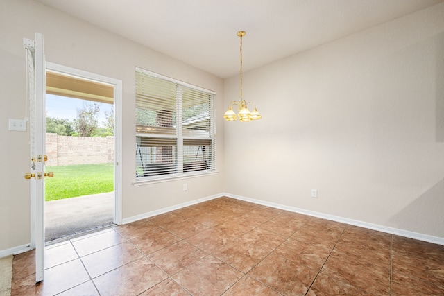 unfurnished dining area with tile patterned flooring and a notable chandelier