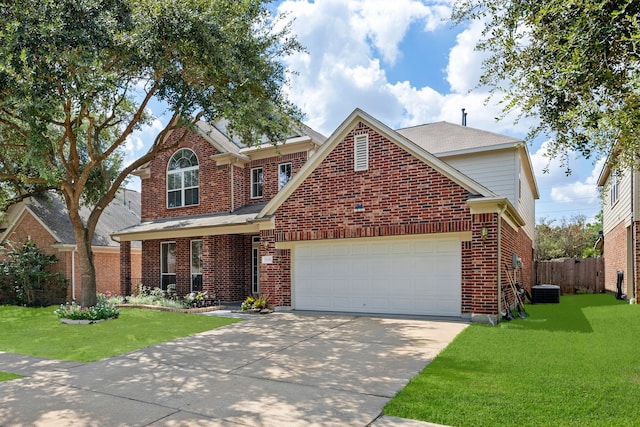 front facade with a garage and a front lawn