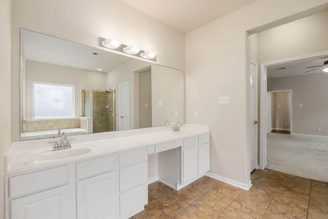 bathroom featuring tile patterned flooring, vanity, separate shower and tub, and ceiling fan