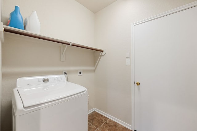 washroom with tile patterned floors and washer / clothes dryer