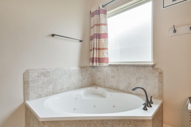 bathroom featuring a relaxing tiled tub