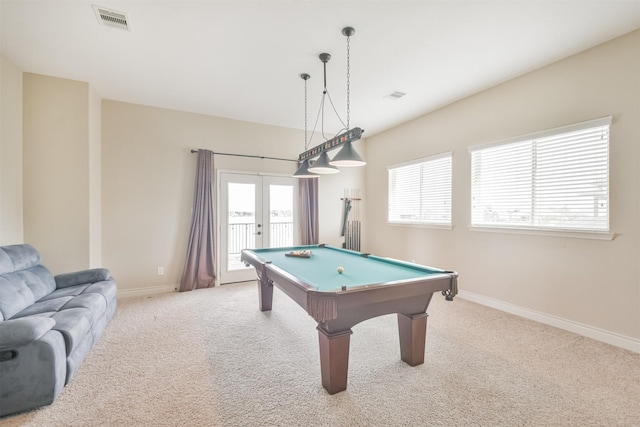 playroom featuring light carpet, pool table, and french doors