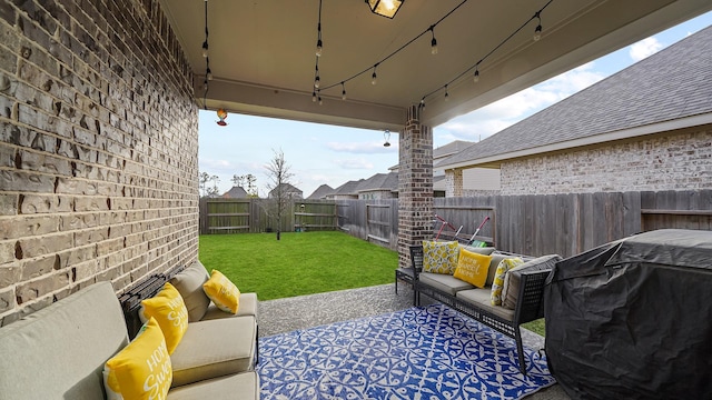 view of yard with a patio area and outdoor lounge area