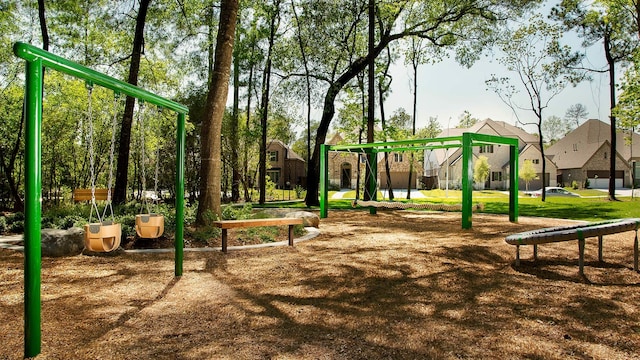 view of home's community featuring a playground