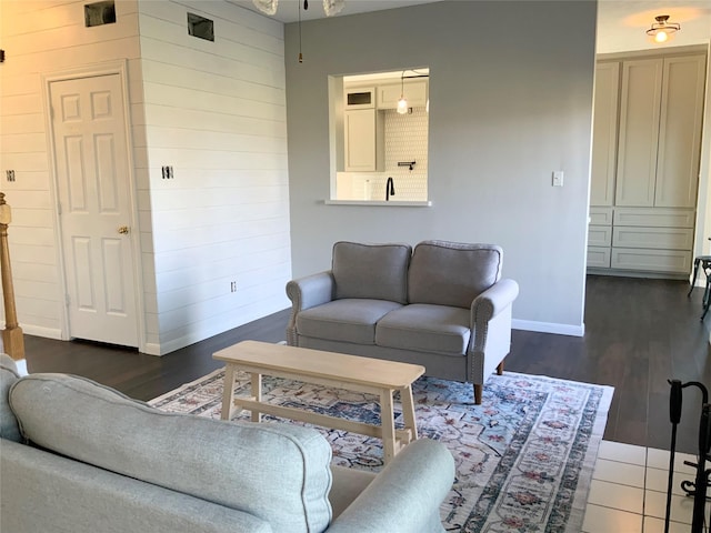 living room featuring dark hardwood / wood-style flooring