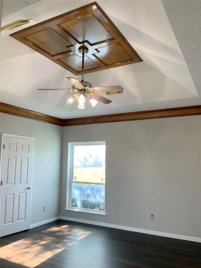 empty room featuring a textured ceiling, ceiling fan, and dark wood-type flooring