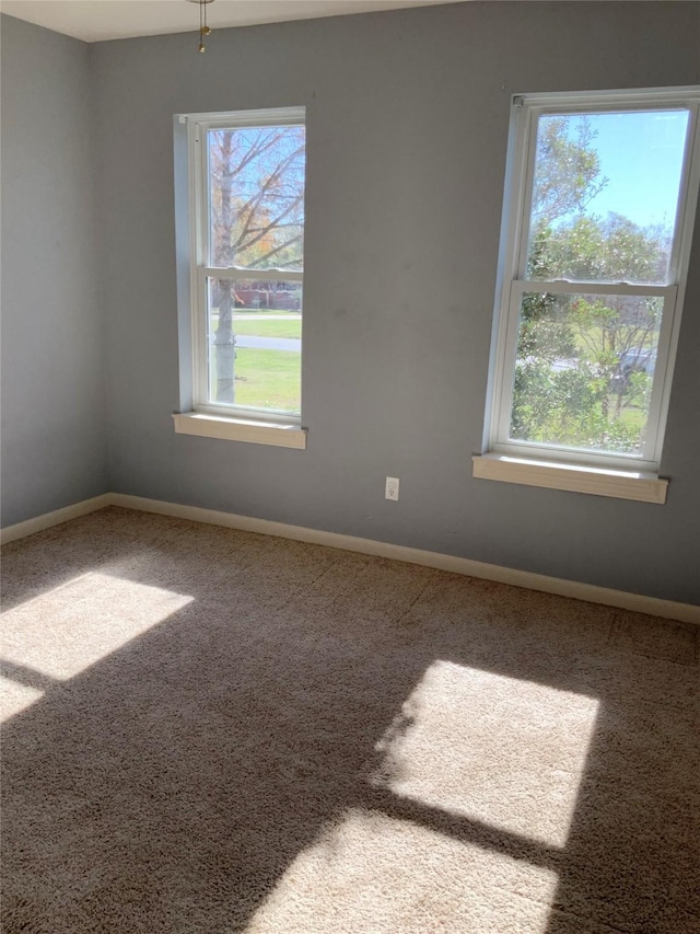 view of carpeted spare room