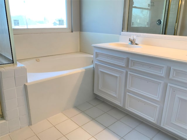 bathroom featuring tile patterned flooring, vanity, and independent shower and bath