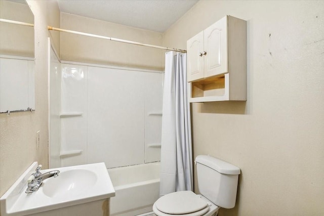 full bathroom featuring a textured ceiling, vanity, toilet, and shower / bathtub combination with curtain