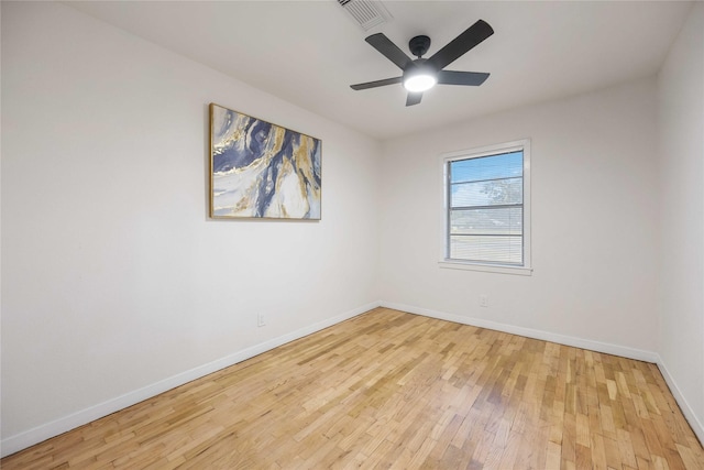 unfurnished room featuring light hardwood / wood-style floors and ceiling fan