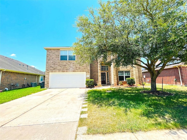 view of front of property with a front yard, central AC, and a garage