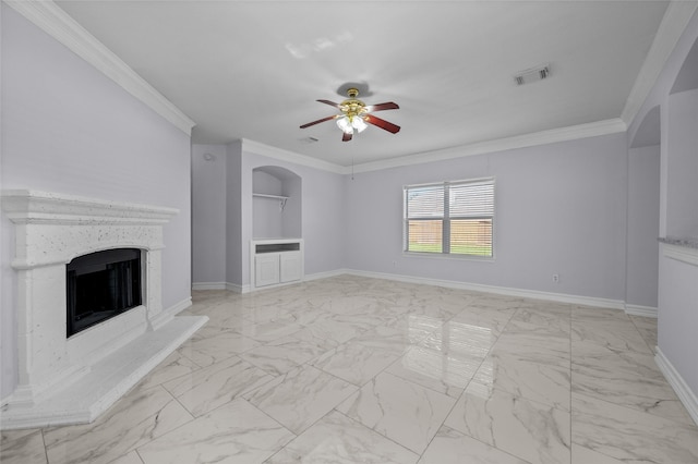 unfurnished living room with ceiling fan and ornamental molding