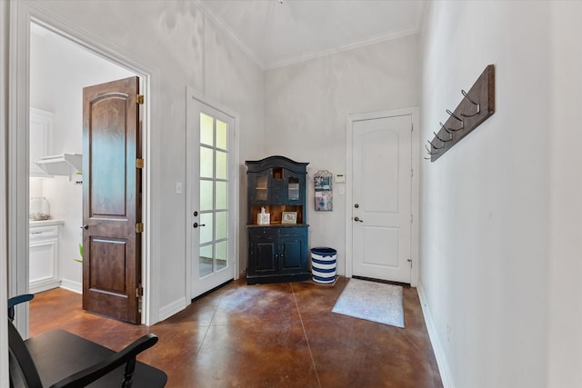 foyer featuring crown molding