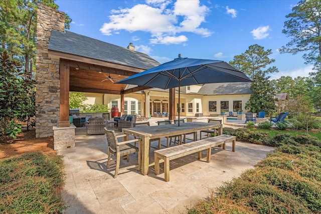 view of patio with french doors, an outdoor hangout area, ceiling fan, and a swimming pool