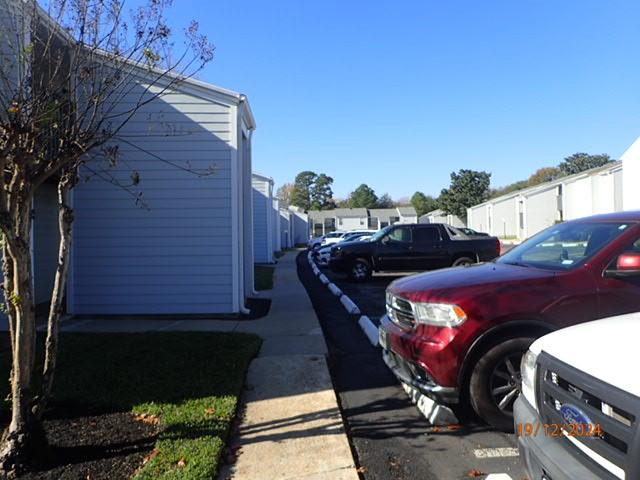 view of parking / parking lot