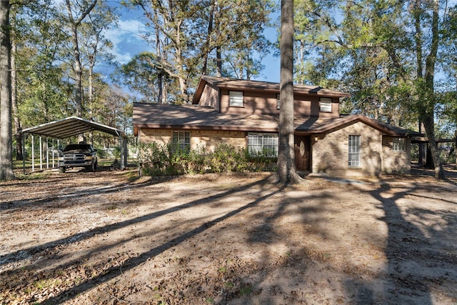 view of front facade with a carport