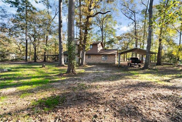 view of yard featuring a carport