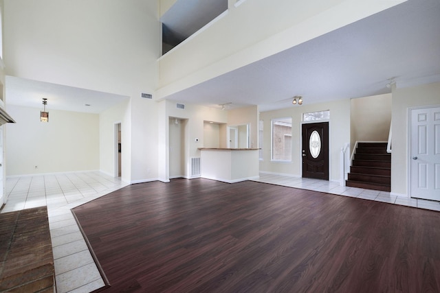 unfurnished living room with light wood-type flooring