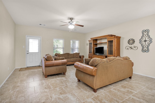 living room featuring ceiling fan