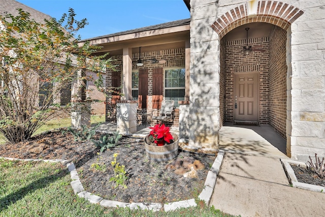 doorway to property with a porch