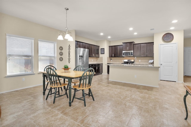 dining room with an inviting chandelier