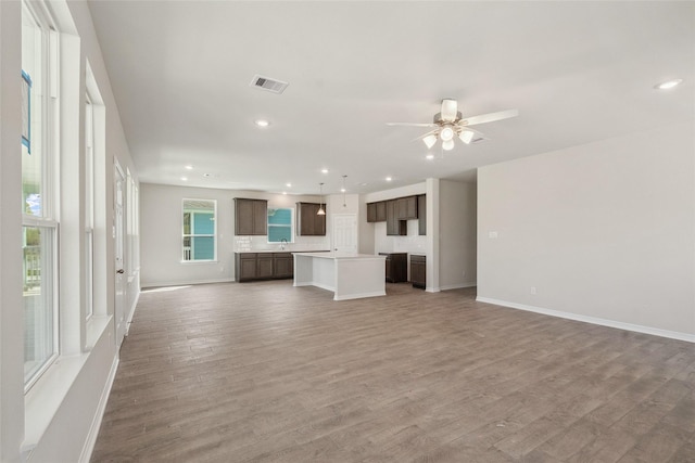 347 Bay Oaks St, La Porte, TX 77571 - unfurnished living room featuring recessed lighting, light wood-type flooring, and ceiling fan