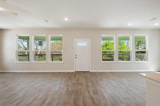 347 Bay Oaks St, La Porte, TX 77571 - entrance foyer featuring wood finished floors, plenty of natural light, a ceiling fan, and recessed lighting
