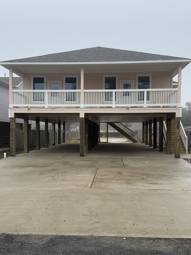 beach home with a carport and covered porch