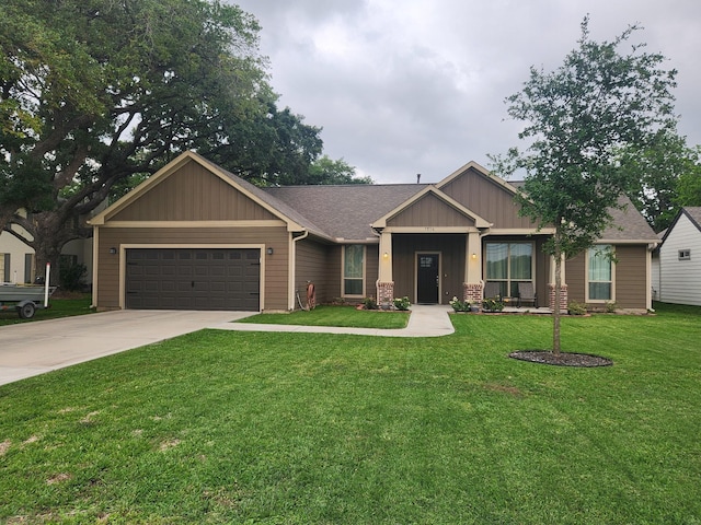 craftsman-style house featuring a front yard and a garage