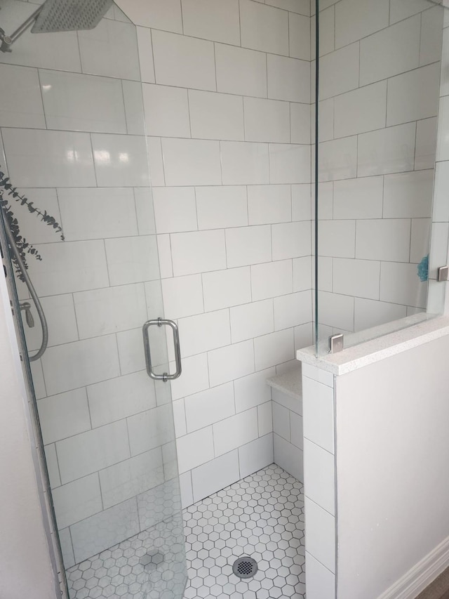 bathroom featuring an enclosed shower