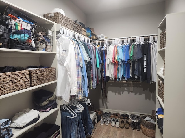 walk in closet featuring wood-type flooring