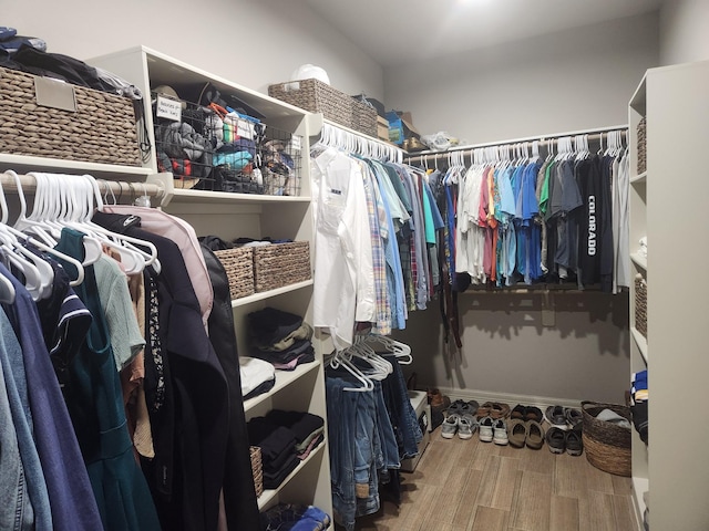 walk in closet featuring wood-type flooring