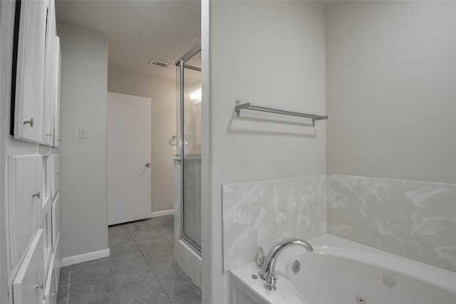 bathroom featuring separate shower and tub and tile patterned flooring