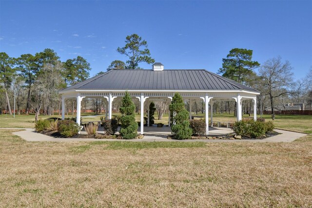 view of community with a gazebo and a yard