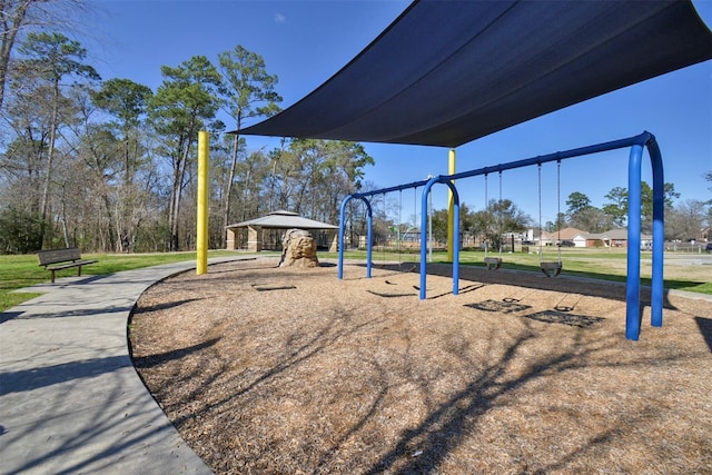 view of playground with a yard