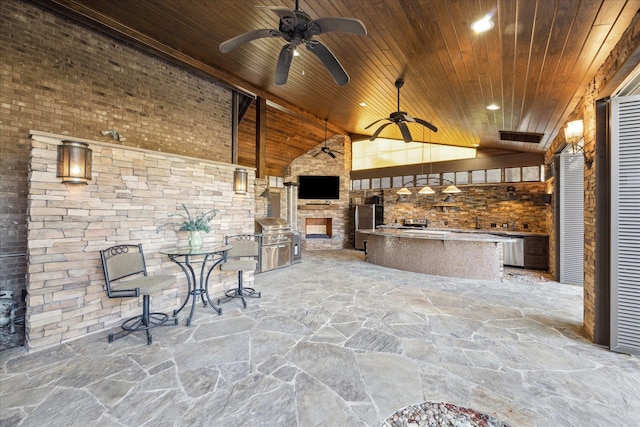 view of patio featuring ceiling fan and area for grilling